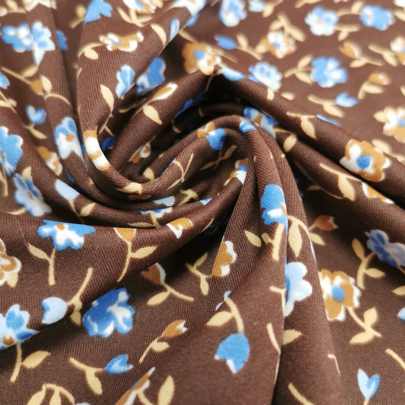 lycra marron à motif de fleurs bleue