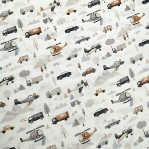 tissu blanc avec un cadrillage comme une feuille de cahier, avec des motifs de camions; hélicoptère, voiture, montgolfière etc...
