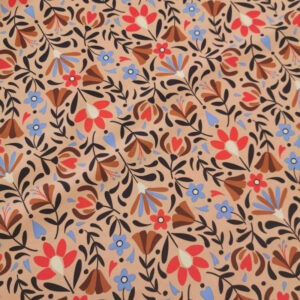 tissu à motifs de fleurs de différentes tailles dans un assemblage harmonieux