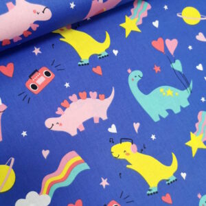 Tissu de couleur indigo avec des motifs de dinosaures mignons, colorés, vifs et joyeux.